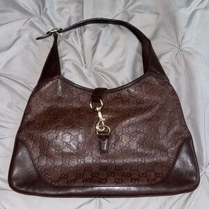 Authentic Gucci, shoulder bag with gold details